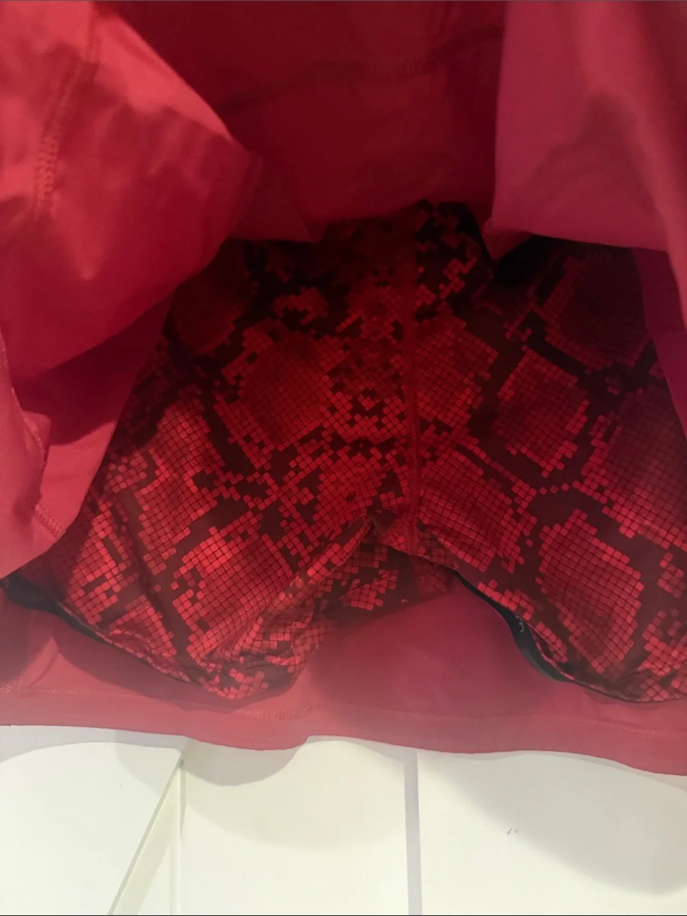 Lululemon Red Athletic Skirt with Snake-Print Waistband